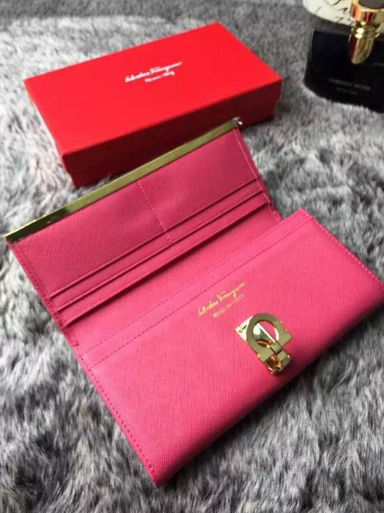 Ferragamo women wallet in pink color with gold Gancio buckle 2016